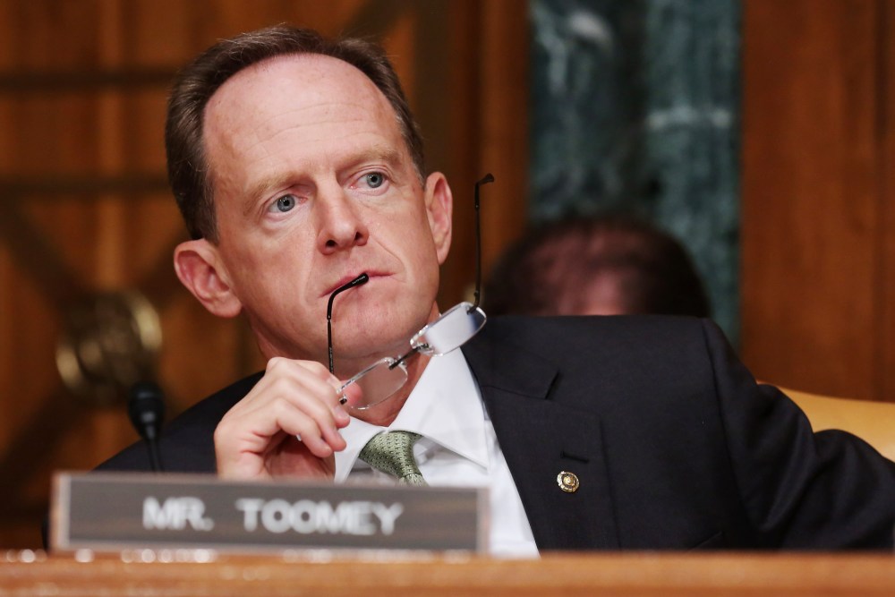 Image: Republican Sen. Pat Toomey of Pennsylvania listens to testimony