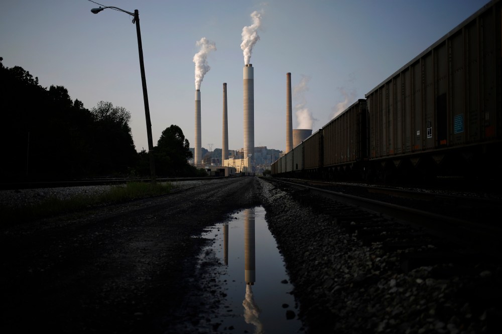 Image: Emissions rise from the American Electric Power Co. Inc. coal power plant in Winfield, West Virginia, on July 31, 2014.