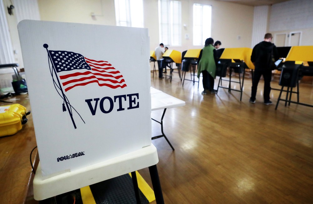 Image: Voters cast ballots during early voting for the presidential primary in Los Angeles, Calif., on March 1, 2020.