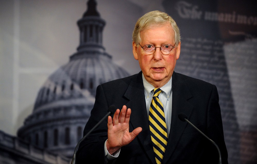 Image: Senate Majority Leader Mitch McConnell (R-KY) speaks to the media after a meeting to wrap up work on coronavirus economic aid legislation, during the coronavirus disease (COVID-19) outbreak, in Washington