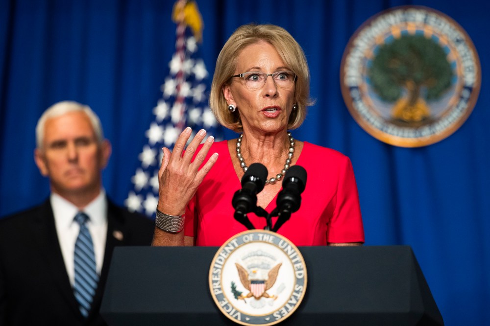 Image: Mike Pence, Betsy DeVos