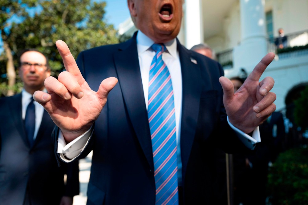 Image: President Donald Trump speaks as he departs the White House.