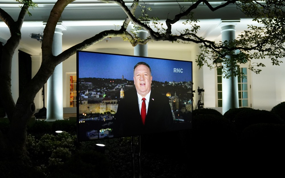 Image: U.S. Secretary of State Mike Pompeo is seen giving his live address to the 2020 Republican National Convention from Israel on a TV at the White House in Washington