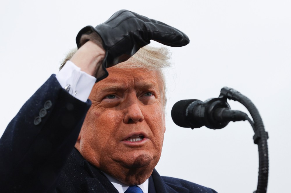 Image: U.S. President Donald Trump holds a campaign rally at Capital Region International Airport in Lansing, Michigan