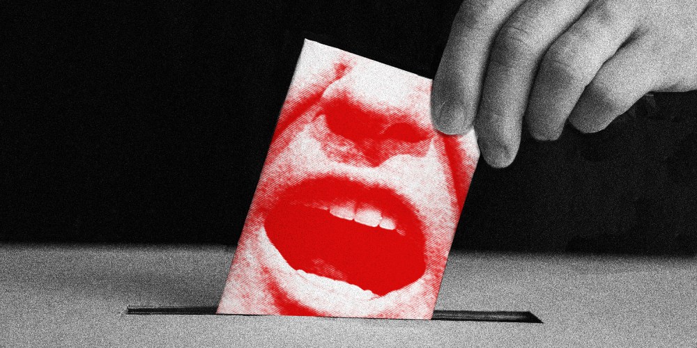 Image: A hand puts in a ballot which has a close up of Trump's screaming face into the ballot box