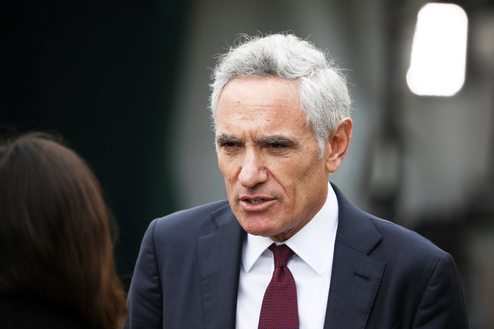 Image:  Trump coronavirus disease advisor Dr. Scott Atlas walks outside the White House in Washington