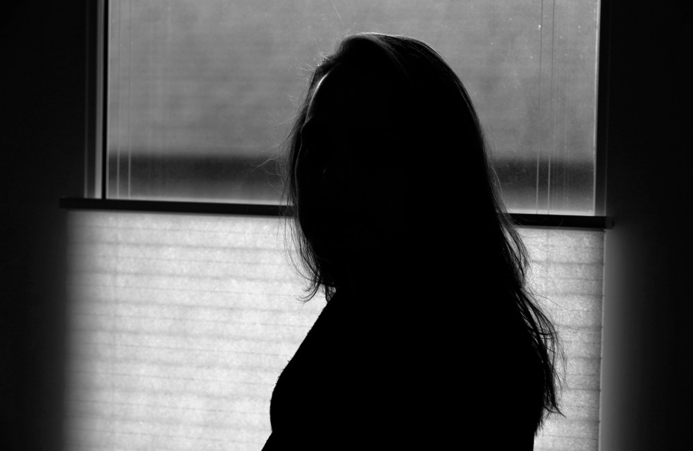 Image: A former FBI analyst, who asked to be identified only as Becky, on Dec. 9, 2020. Becky alleged that a FBI supervisory special agent licked her face and groped her at a colleague's farewell party in 2017 and was subsequently diagnosed with post-trau