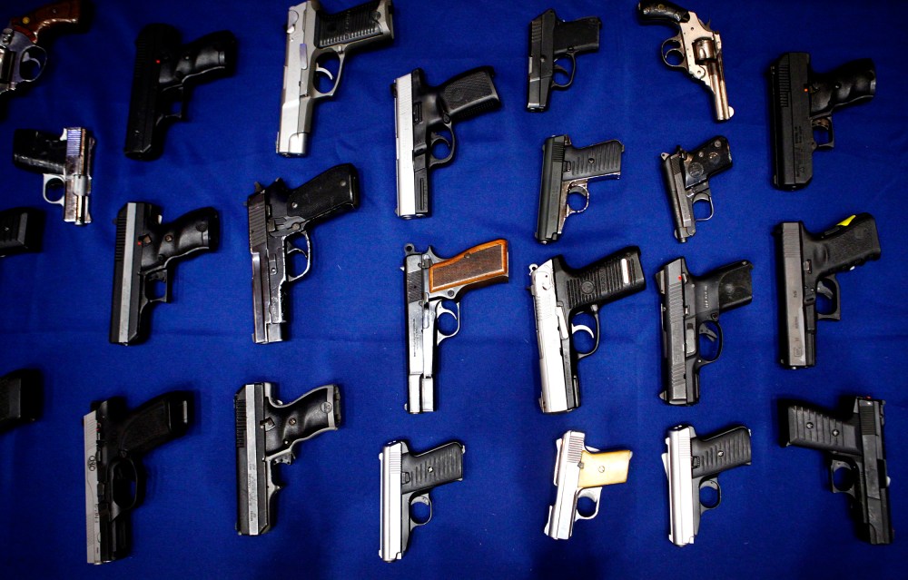 Image: Seized handguns in New York in 2013.