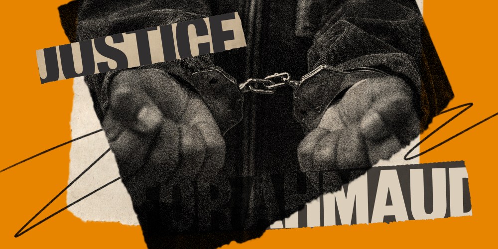 Photo illustration: Image of hands in handcuffs, two pieces of paper partially read the words,"Justice" and "Ahmaud".