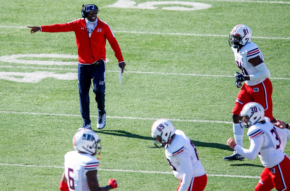 Image: Jackson State head coach Deion Sanders coaching his team.