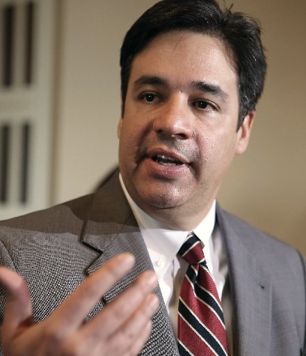 File photo: Rep. Raul Labrador (R-ID) talks to reporters after the House passed the STEM Jobs Act November 30, 2012 in Washington, DC. The act would allow foreign students who graduated from U.S. colleges and universities with degrees in science and...