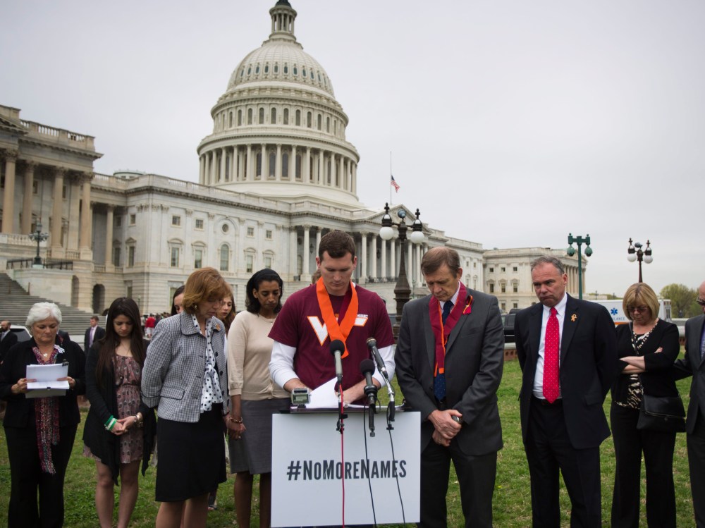 On the sixth anniversary of the Virginia Tech shooting, Colin Goddard, who was shot four times, leads a moment of silence for the 32 victims, along with the '3,300 lives lost to gun violence since the Newtown shooting,' outside the U.S. Capitol in...