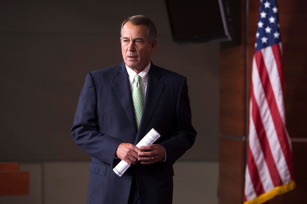 John Boehner walks to the podium to hold a news conference, on Capitol Hill, April 10, 2014.