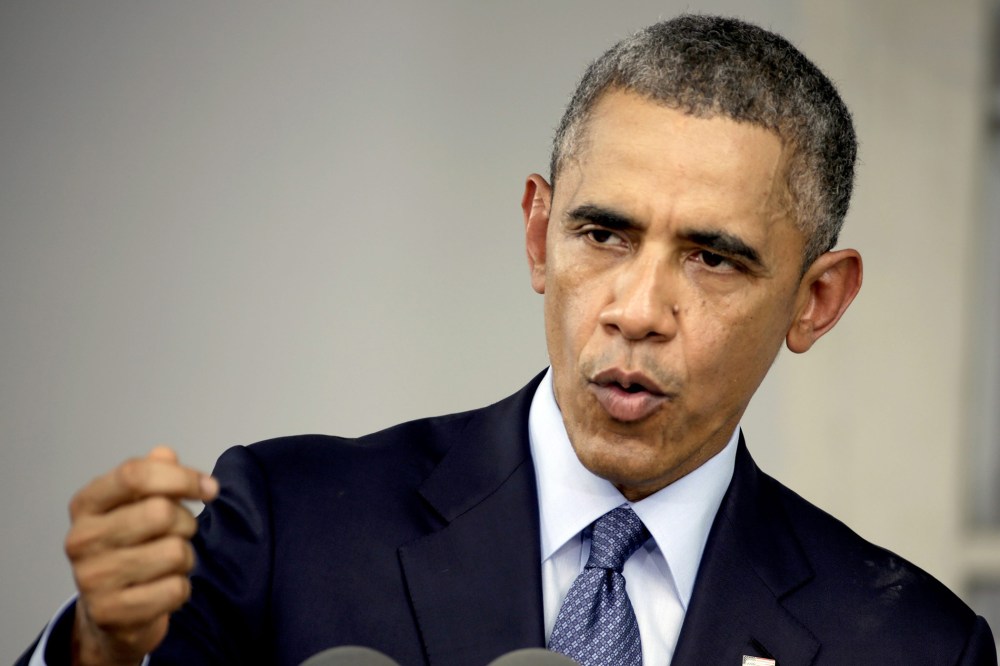 US President Barack Obama speaks during a joint press conference with Myanmar opposition leader Aung San Suu Kyi on Nov. 14, 2014. (Nyein Chan Naing/EPA)