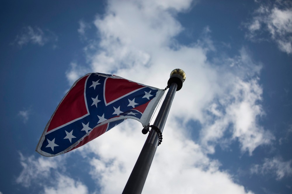The Confederate flag is seen outside the South Carolina State House Building in Columbia, S.C., on June 23, 2015. (Photo by John Taggart/EPA)