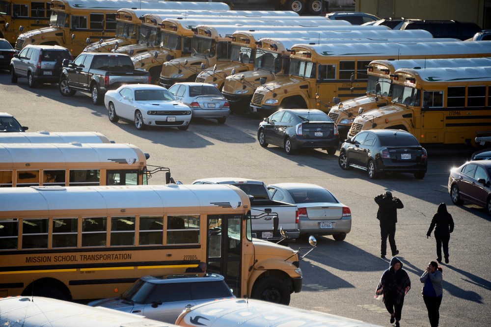 Los Angeles Unified school district buses, Dec. 15, 2015. (Photo by Paul Buck/EPA)