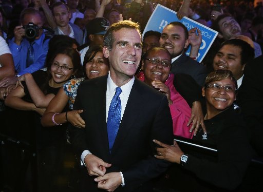 Los Angeles Mayor Eric Garcetti with supporters at an election night party at the Hollywood Palladium in Hollywood, California, May 21, 2013. (Photo by: Lucy Nicholson/Reuters).
