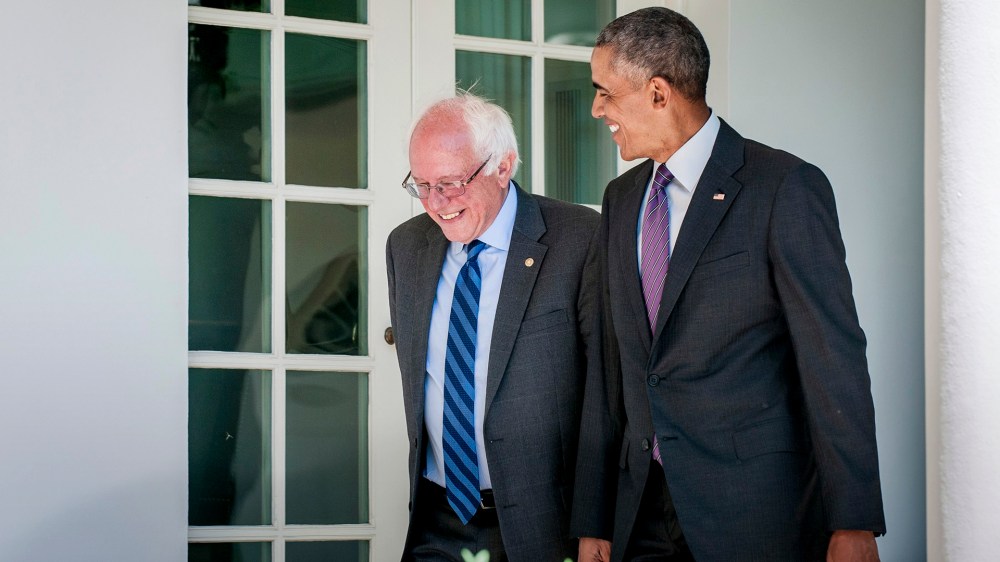 President Barack Obama walks with Democratic presidential candidate Bernie Sanders down the Colonnade during their meeting at the White House in Washington, D.C., June 9, 2016. (Photo by Pete Marovich/Pool/EPA)