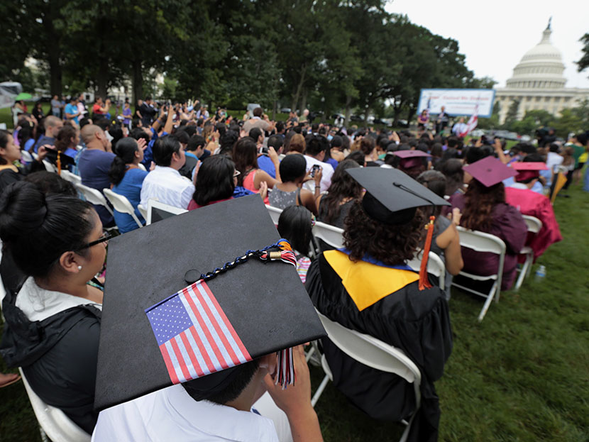 DREAMers (Development, Relief, and Education for Alien Minors) listen to speakers during a "United we Dream," rally on Capitol Hill in Washington, Wednesday, July 10, 2013. (Photo by Alex Brandon/AP)