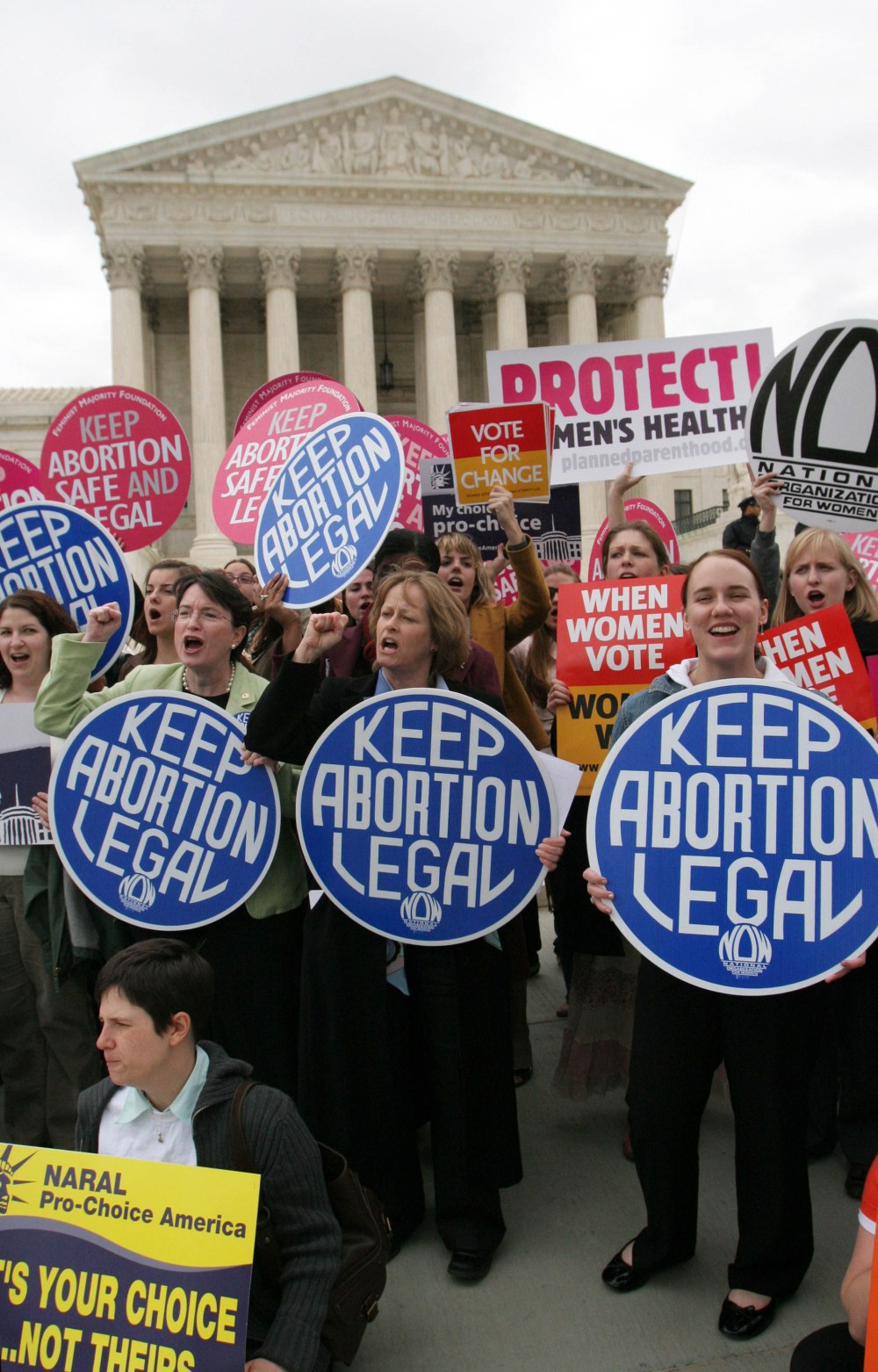 Abortion rights activist take part in a demonstration outside the Supreme Court in Washington, Wednesday, April 18, 2007.
