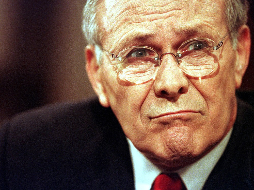 File Photo: Defense Secretary Donald Rumsfeld frowns before his appearance on the CBS talk show "Face the Nation" June 23, 2001 in Washington, D.C. (Photo by Karin Cooper/Getty Images, File)