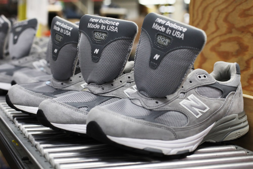 A line of New Balance 993 shoes are seen at the New Balance shoe factory in Norridgewock, Maine, July 19, 2011.