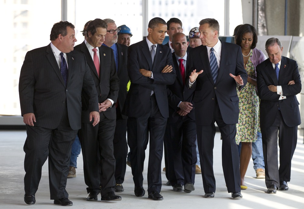 President Barack Obama and first lady Michelle Obama visit the World Trade Center site for a briefing on construction progress, Thursday, June 14, 2012, in New York. With him on the tour are New Jersey Gov. Chris Christie, left, New York Mayor Michael...