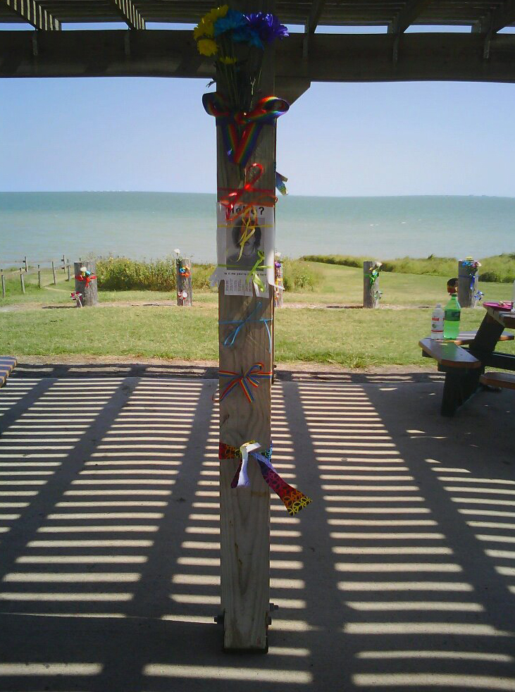 Rainbow ribbons, messages, flowers and cut-out hearts were left near the site in Portland, Tex., where a couple found Mollie Judith Olgin, 19, and Mary Kristene Chapa, 18, after they were shot.