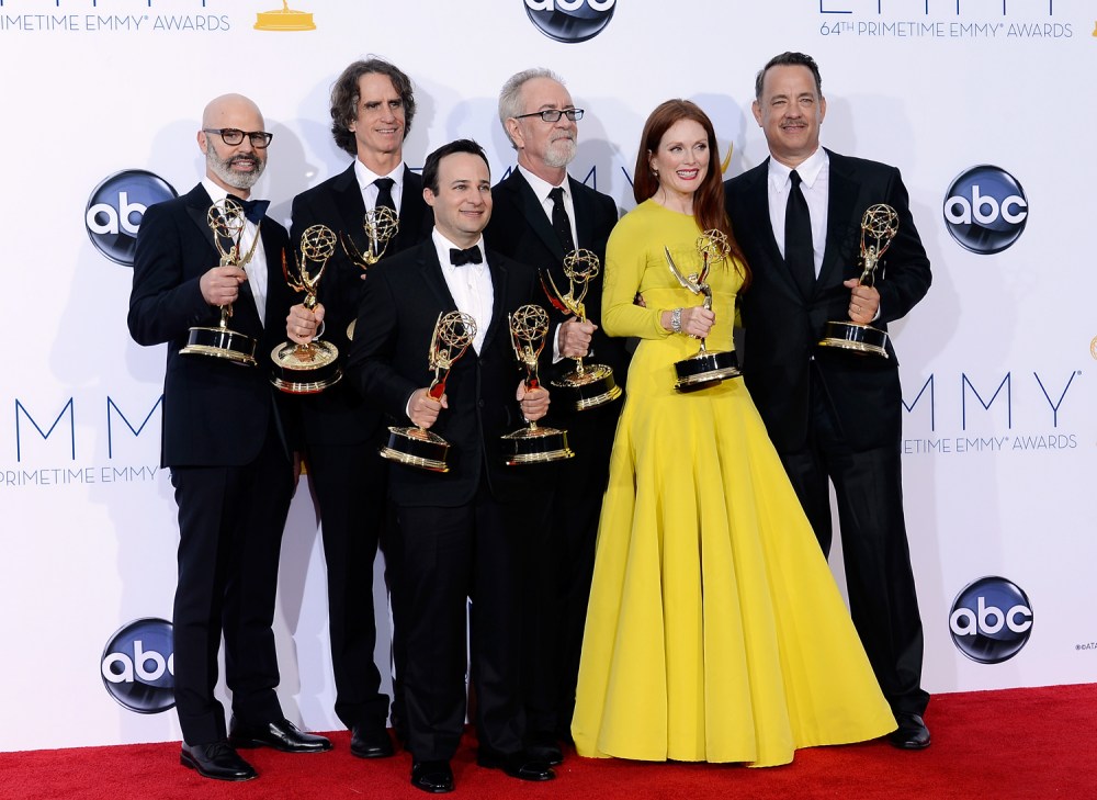 Producer Steven Shareshian, director Jay Roach, writer Danny Strong, producer Gary Goetzman, actress Julianne Moore, and producer Tom Hanks, winners Outstanding Miniseries or TV Movie for "Game Change," pose in the press room during the 64th Annual...