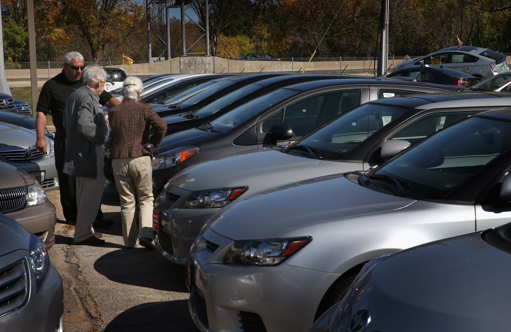 People look at cars at Northbrook Toyota on October 2, 2012 in Northbrook, Illinois. Toyota sales in September rose 42% from a year earlier. Chrysler had a 12% increase while Ford and General Motors sales were mostly flat (Photo: Getty Images/Scott Olson)