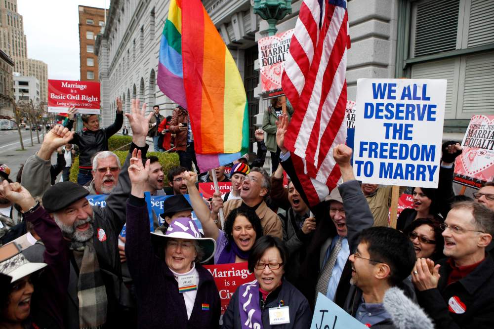 Gay Marriage advocates cheer during a rally moments before hearing the news of the Proposition 8 over-ruling outside the Ninth Circuit Courthouse in San Francisco, California, in this February 7, 2012, file photo (Photo: Reuters/Beck Diefenbach)