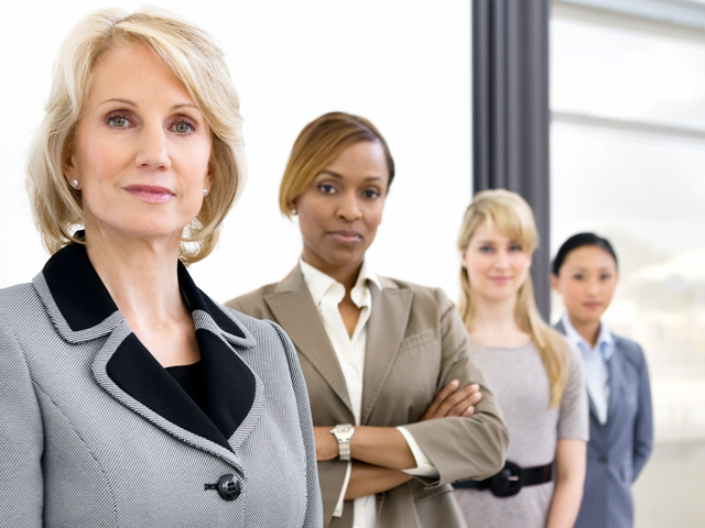 Businesswomen standing in office