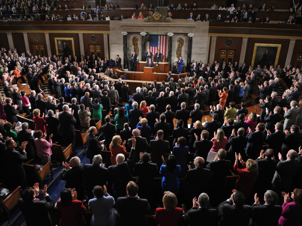 File Photo: US President Barack Obama receives applause as he delivers his State of the Union address before a joint session of Congress January 24, 2012 on Capitol Hill in Washington, DC. (Photo by Mandel Ngan/AFP/Getty Images/File)