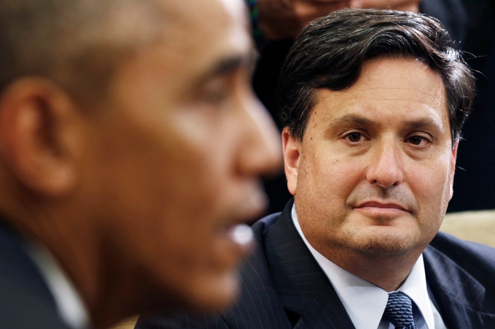 U.S. President Barack Obama holds a meeting with Ebola Response Coordinator Ron Klain (R) in the Oval Office of the White House in Washington on Oct. 22, 2014.
