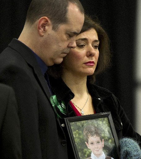 The parents of Benjamin Wheeler, a victim of the Sandy Hook Elementary School shooting, attend a news conference on January 14, 2013 in Newtown, Connecticut. Families of victims asked that there be a dialogue to find solutions on how to prevent similar...