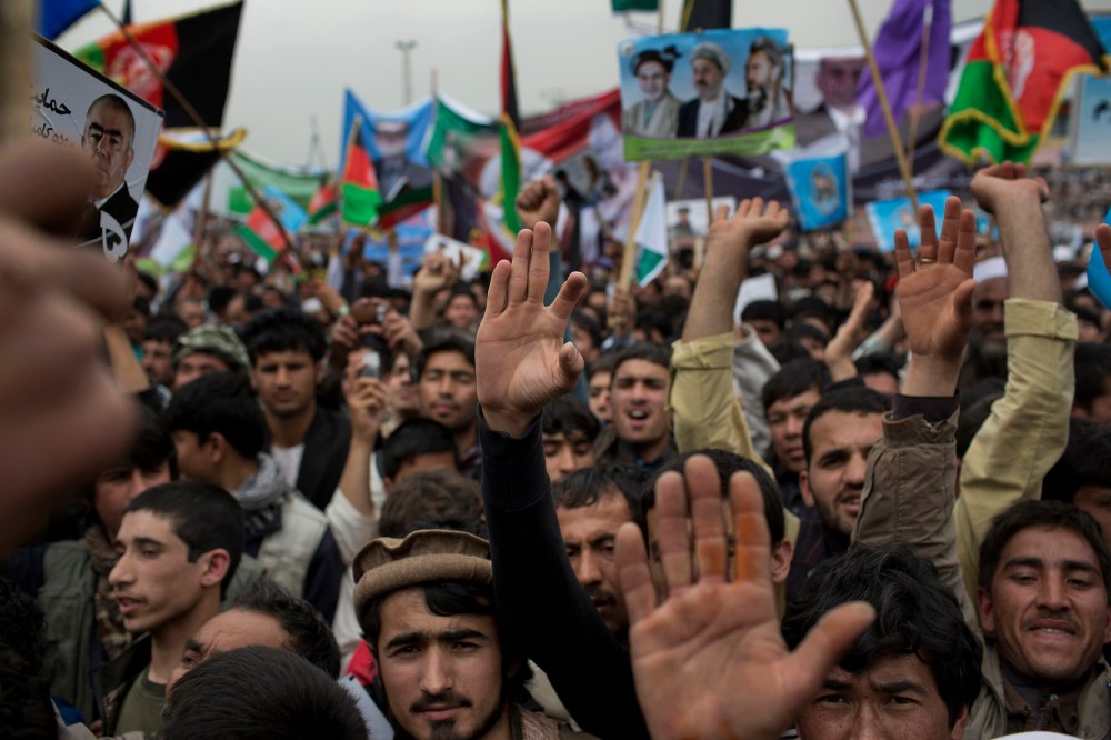 Supporters attend a rally for presidential candidate Ashraf Ghani at a stadium in Kabul, Afghanistan, April 1, 2014.