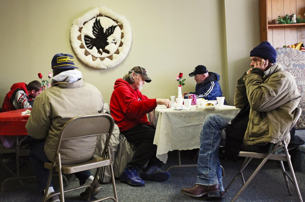 People eat a free community meal at The Center on March 4, 2012 in Lima, Ohio. A census report released in 2011 showed that 15.3 percent of Ohioans live in poverty, the highest rate in the state in more than 30 years.