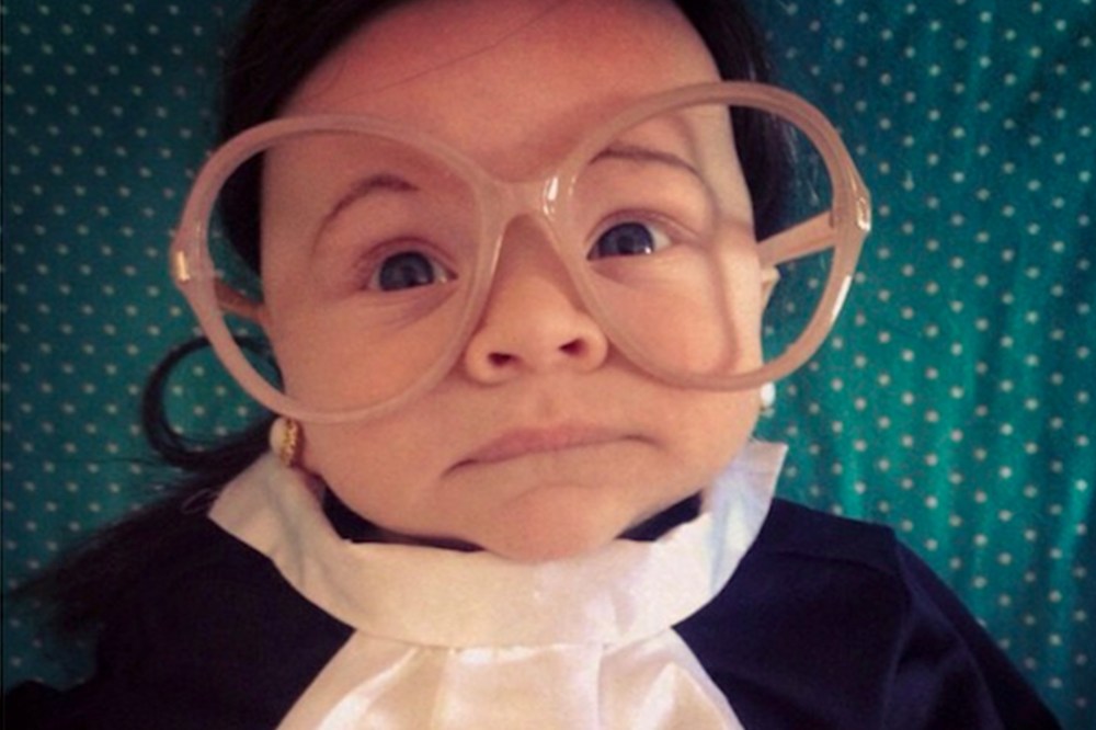 Child dressed as Supreme Court Justice Ruth "Baby" Ginsberg. (@taffyakner via twitter via NBC News)