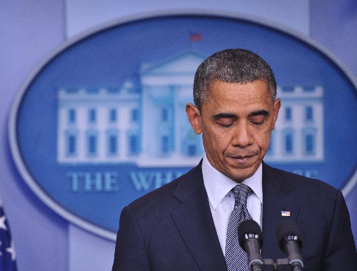 US President Barack Obama speaks following the shooting in Sandy Hook Elementary School in Connecticut, which left at least 26 people dead, 18 of them children. (Photo By: Mandel/Getty Images)