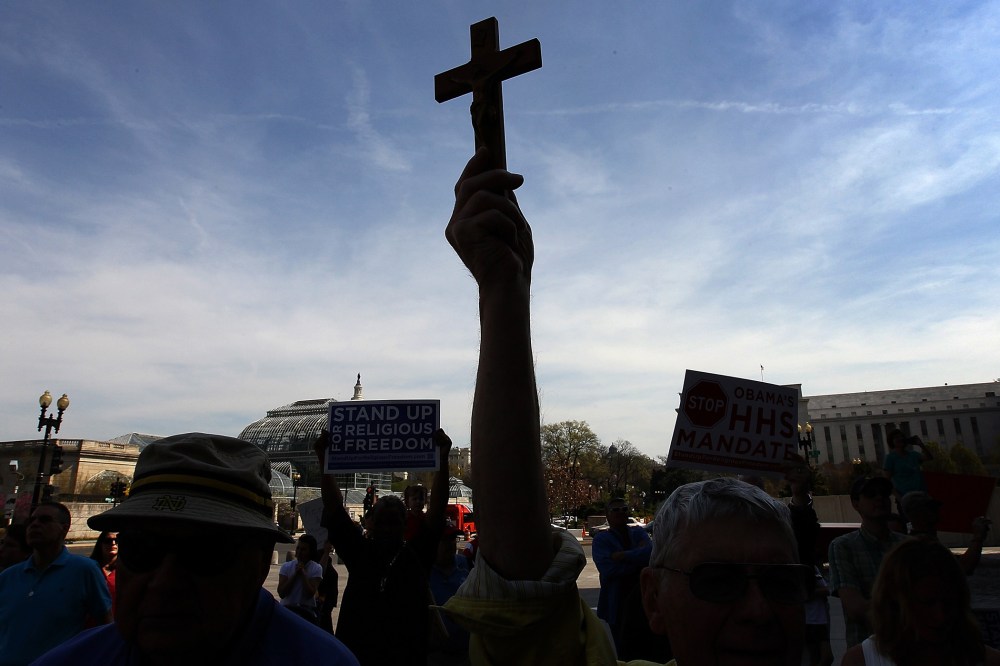 Protesters participate in a "Stand Up for Religious Freedom" rally on March 23, 2012 in Washington, DC. (Photo by Win McNamee/Getty)