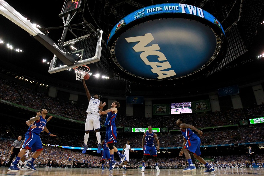 The NCAA logo is seen as the Kentucky Wildcan as the Kentucky Wildcats play against the Kansas Jayhawks in the first half in the National Championship Game of the 2012 NCAA Division I Men's Basketball Tournament on April 2, 2012 in New Orleans, Louisiana.