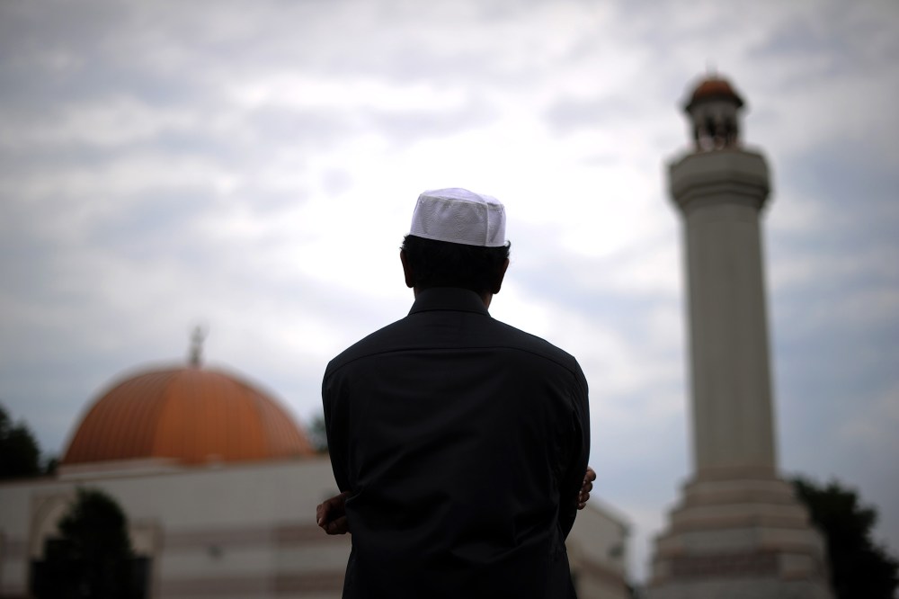 A man takes part in a special morning prayer at a mosque. (Photo by Jewel Samad/AFP/Getty)