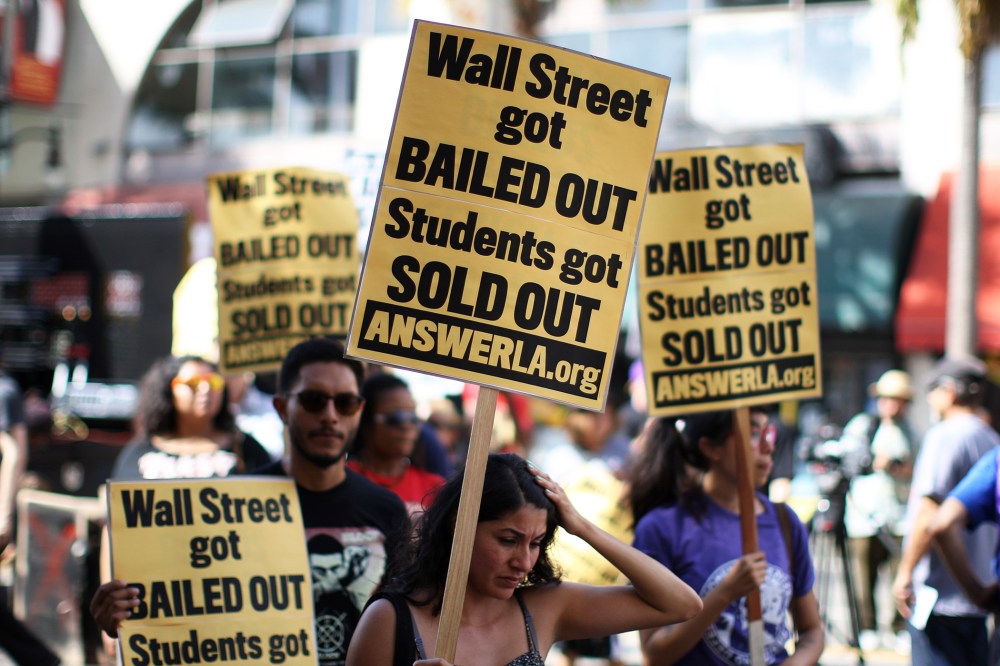 Students protest the rising costs of student loans for higher education on Hollywood Boulevard on Sept. 22, 2012 in Los Angeles, Calif. (Photo by David McNew/Getty)