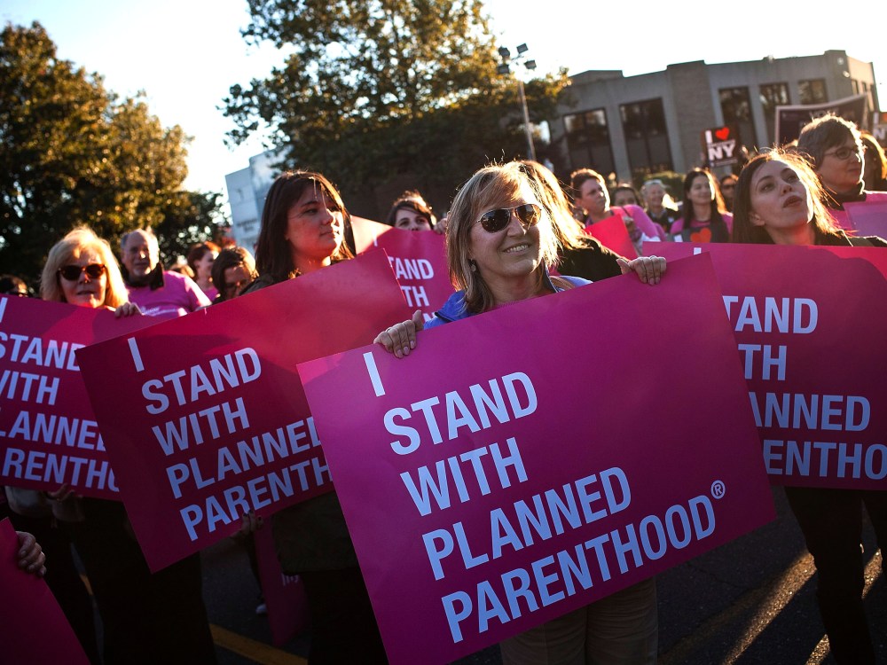 Women protest for continued funding of Planned Parenthood outside Hofstra University prior to the second presidential debate on October 16, 2012 in Hempstead, New York. U.S. President Barack Obama and Republican presidential candidate Mitt Romney will...