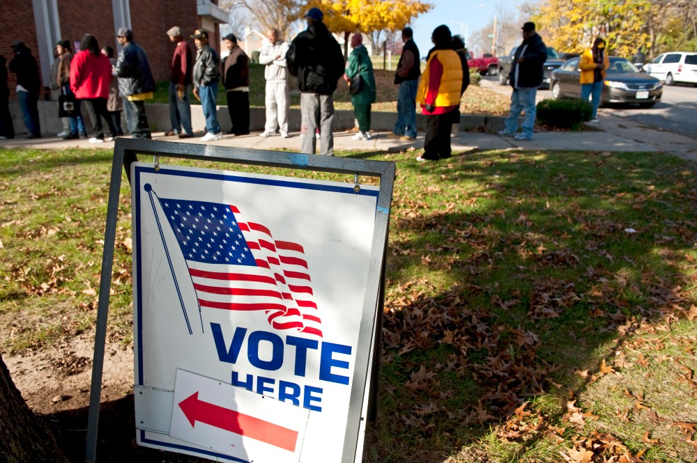 Voters wait in line to cast their vote at Mount Pleasant Baptist Church on November 6, 2012 in Kansas City, Missouri.