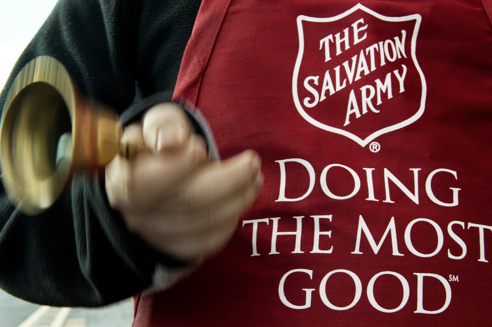 A Salvation Army volunteer rings the collection bell on November 24, 2012.