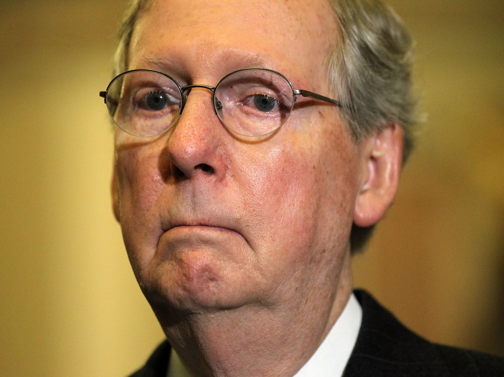 File Photo: U.S. Senate Minority Leader Sen. Mitch McConnell (R-KY) listens during a news briefing after the weekly Senate Republican Policy Luncheon December 11, 2012 on Capitol Hill in Washington, DC. McConnell discussed various topics with the...
