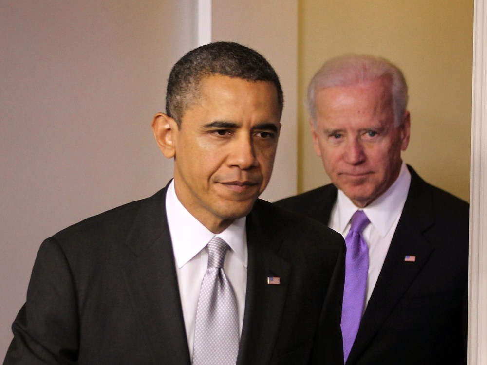 U.S. President Barack Obama (L) and Vice President Joseph Biden (R) arrive at an announcement on gun reform in the James Brady Press Briefing Room of the White House December 19, 2012 in Washington, DC. President Obama announced that he is making an...