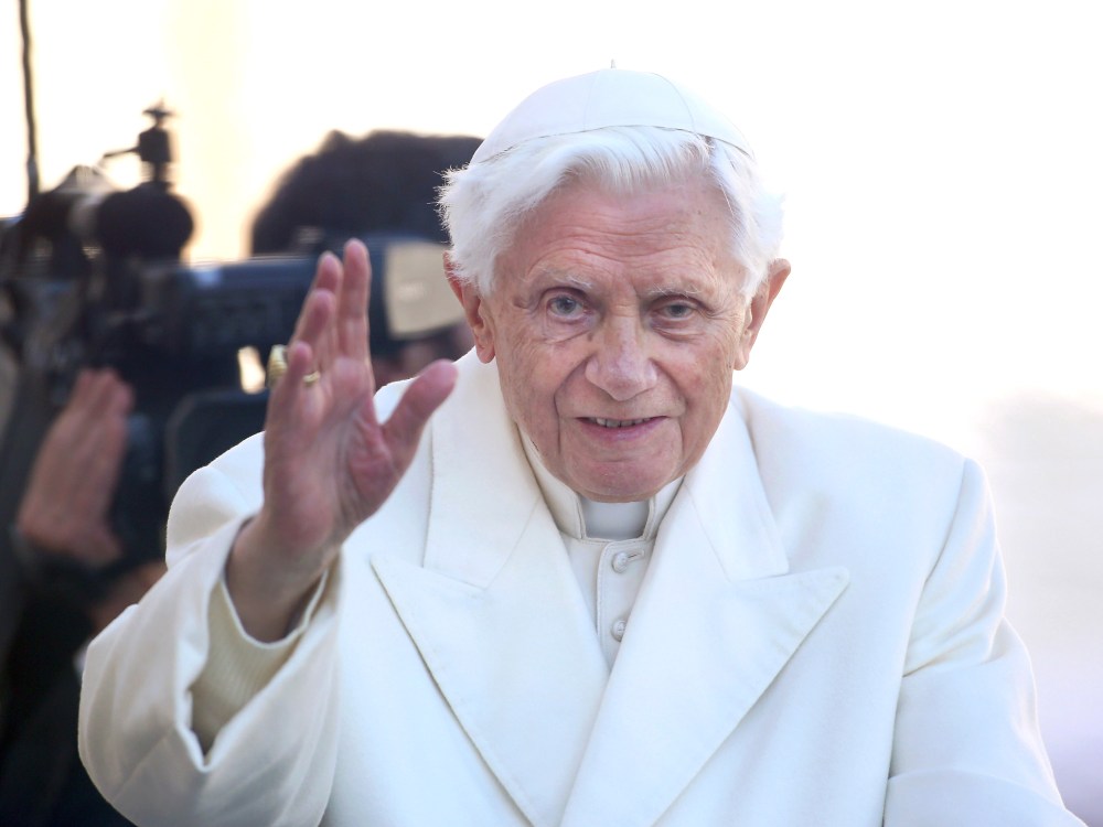 Pope Benedict XVI waves to the faithful as he arrives in St Peter's Square for his final general audience on February 27, 2013 in Vatican City, Vatican. The Pontiff attended his last weekly public audience before stepping down tomorrow. Pope Benedict...