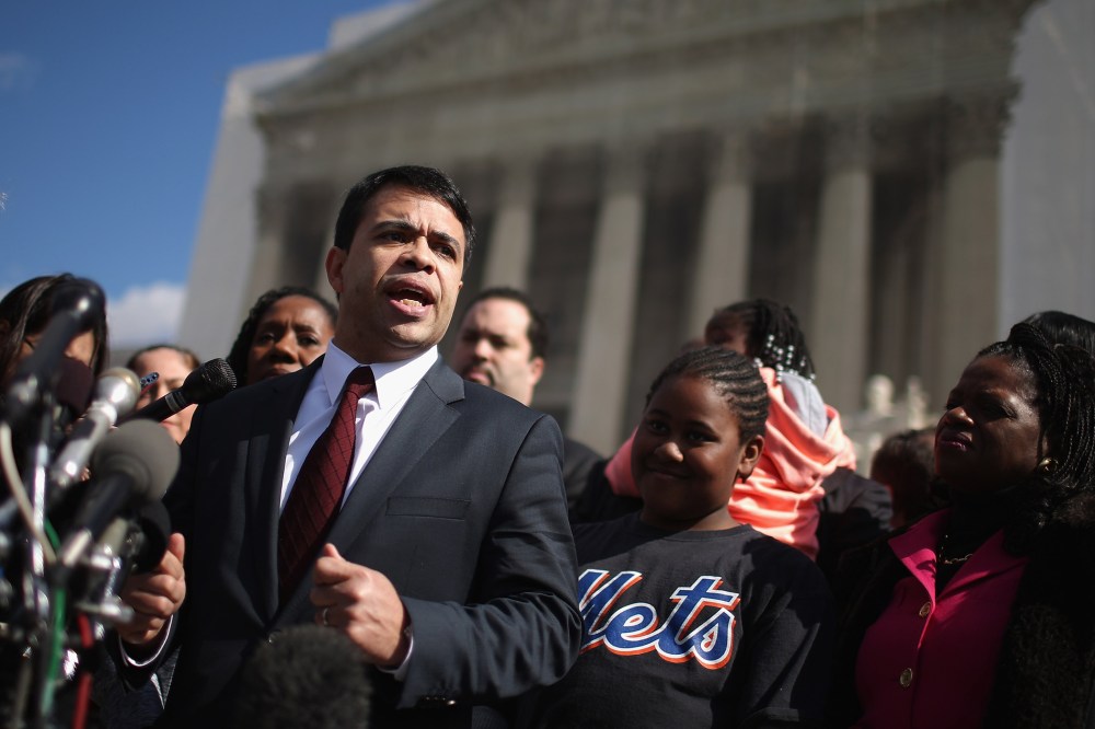 NAACP Legal Defense and Educational Fund Special Council Debo Adegbile talks to reporters outside of the U.S. Supreme Court February 27, 2013.